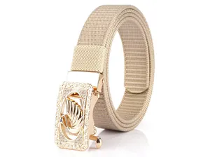 Detail of khaki nylon belt featuring a gold alloy buckle with swan motif and crystals