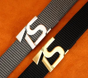 Detailed view of nylon tactical belts with silver and gold S-shaped automatic buckles
