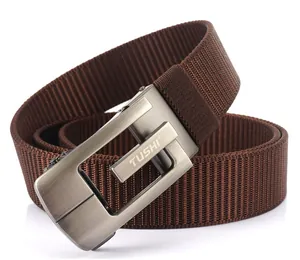 Detailed texture of brown woven nylon belt with brushed metal G-style buckle