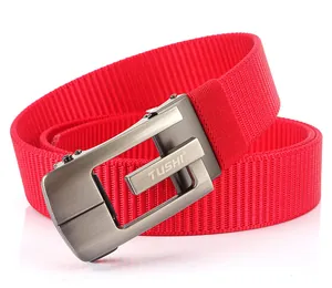 Close-up of red nylon woven belt with gunmetal brushed metal automatic buckle