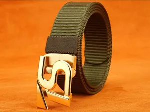 Detail of army green nylon tactical belt with a brushed gold metal automatic buckle