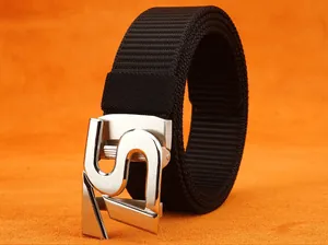 Detail of black nylon tactical belt with brushed silver S-shaped automatic metal buckle