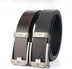 Detail of men's genuine leather belts in black and brown with metal automatic buckles