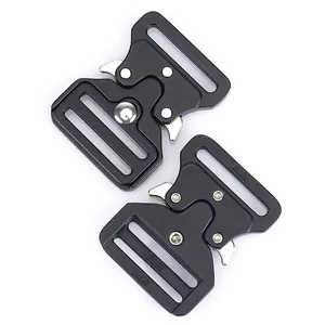 Macro shot of 32mm cobra style quick-release zinc alloy buckles in matte black finish