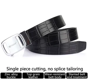 Detail of genuine cowhide leather belt with crocodile pattern and silver alloy buckle