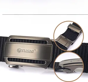 Detail of automatic metal buckle on black nylon belt with quick release lever