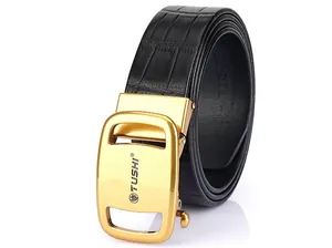 Close-up of black crocodile pattern leather belt with gold automatic buckle and TUSHI logo