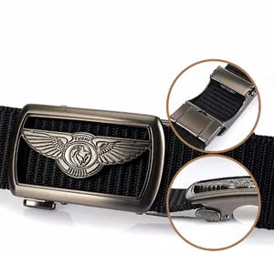 Detail of grey alloy automatic buckle and thick black nylon tactical belt mechanism