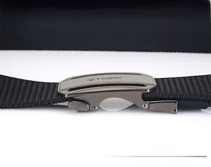 Detailed close-up of the adjustable TUSHI metal buckle and black nylon tactical belt