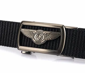 Detailed close-up of nylon belt with zinc alloy buckle featuring lion and wing relief