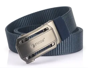 Detail of matte grey automatic buckle with wolf logo and navy nylon braided belt texture