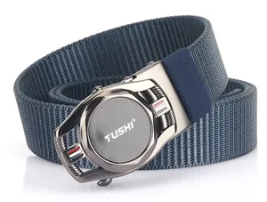 Detail of navy nylon braided belt showing the automatic metal buckle and TUSHI logo