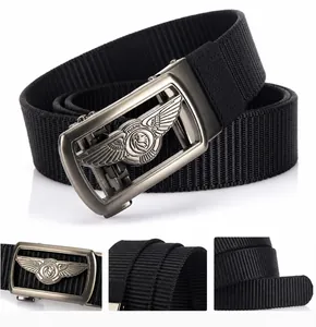 Close-up of black nylon belt with automatic gunmetal buckle and eagle wing engraving