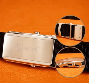 Close-up of brushed stainless steel automatic buckle on black nylon woven tactical belt