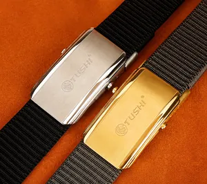 Close-up of sliding stainless steel buckles with lion logo on durable nylon belts
