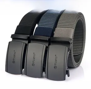 Detail of three nylon belts with zinc alloy automatic buckles in black, blue and grey