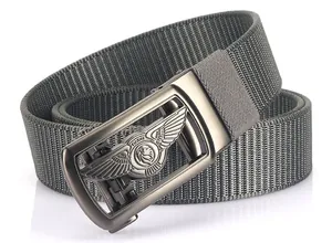 Detail of grey nylon belt showing tactical alloy buckle with embossed lion wing logo