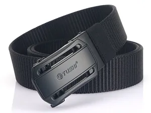 Detail of black nylon woven belt with matte metal automatic buckle featuring TUSHI logo