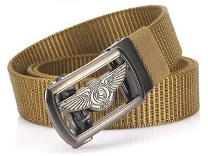 Close-up of khaki nylon belt with brushed metal automatic buckle and lion emblem