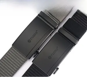 Detail of matte black buckle and textured nylon webbing on men's tactical waist belt