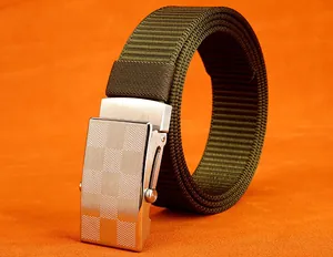 Detail of army green nylon tactical belt with silver checkered metal automatic buckle