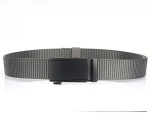 Close-up of adjustable matte black buckle on dark grey nylon outdoor webbing belt