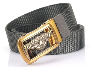 Detail of grey nylon web belt with gold automatic buckle featuring lion crest engraving
