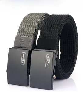 Detail showing the woven canvas belt texture and matte black automatic buckle with TUSHI logo