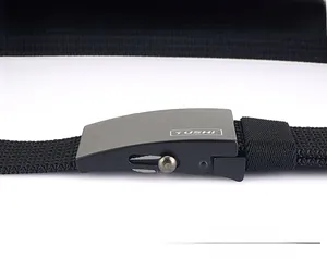 Close-up of matte metal automatic buckle with nylon woven belt and adjustable length