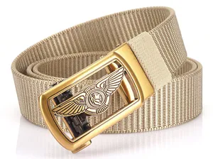 Detailed close-up of khaki nylon tactical belt with golden automatic buckle and wings logo