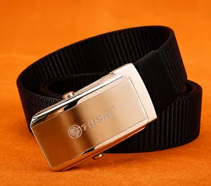 Detailed close-up of golden stainless steel buckle with lion logo on nylon belt