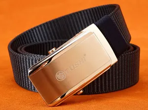 Close-up of golden stainless steel buckle with lion logo on blue nylon belt