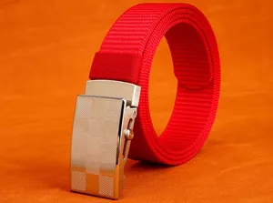 Detailed macro view of bright red nylon belt featuring a textured silver automatic slide buckle