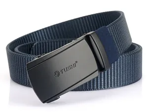 Detail of dark blue nylon woven belt with matte black automatic metal buckle and logo