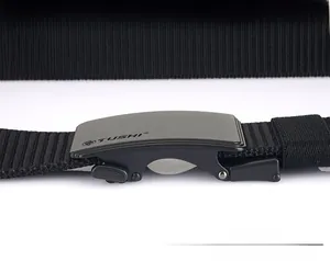 Detail of adjustable black nylon belt with matte metal automatic buckle and logo
