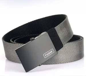 Detail of grey nylon belt showing matte metal automatic buckle with brand logo