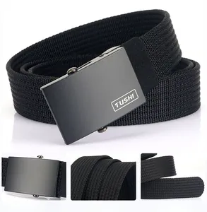 Macro detail of black nylon canvas belt showing the ergonomic alloy automatic buckle and texture