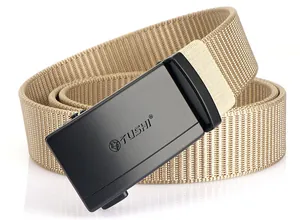 Detail of khaki nylon belt with matte black smooth locking buckle and engraved TUSHI logo