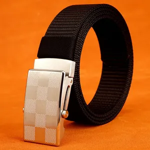 Men's black nylon woven belt with silver checkered automatic slide buckle on orange background