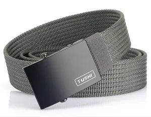 Detail view of woven nylon belt texture with matte metal automatic buckle and logo