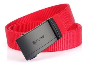 Detail of red nylon woven belt with a matte black automatic buckle and wolf logo