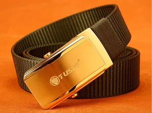 Close-up of golden stainless steel slider buckle with lion logo on nylon belt