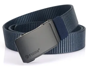 Detail of navy blue nylon belt with matte black automatic buckle and lion logo