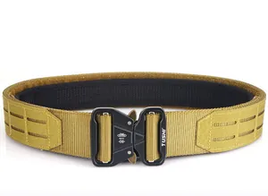 Macro detail of the metal quick-release buckle and tactical nylon webbing texture