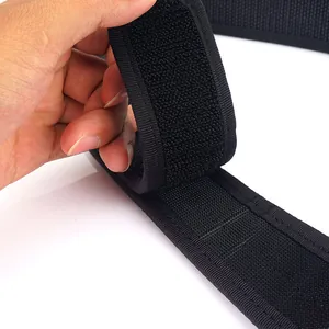 Black tactical nylon belt with hook-and-loop fastener showing a close-up detail view