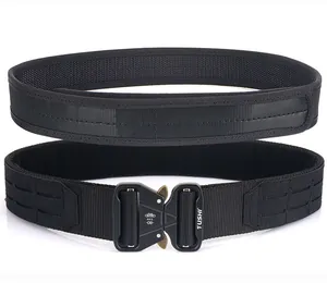 Detail of a two-piece tactical belt system with quick-release metal buckle and MOLLE webbing