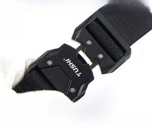 Detail of black tactical belt zinc alloy buckle with quick-release dual slot system