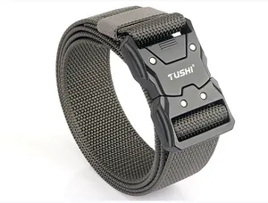 Close-up of tactical nylon belt with quick-release metal buckle and TUSHI logo