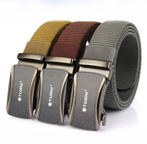 Zinc alloy buckle detail on braided nylon elastic belts in yellow, brown and grey