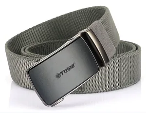 Detail of army green nylon tactical belt with matte grey automatic metal buckle